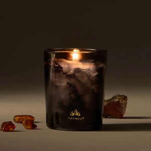 Noir Woods Votive Candle by Thymes